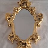 Wooden and gilded mirror with gold leaf