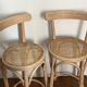 Pair of high chairs, curved wood and caning.