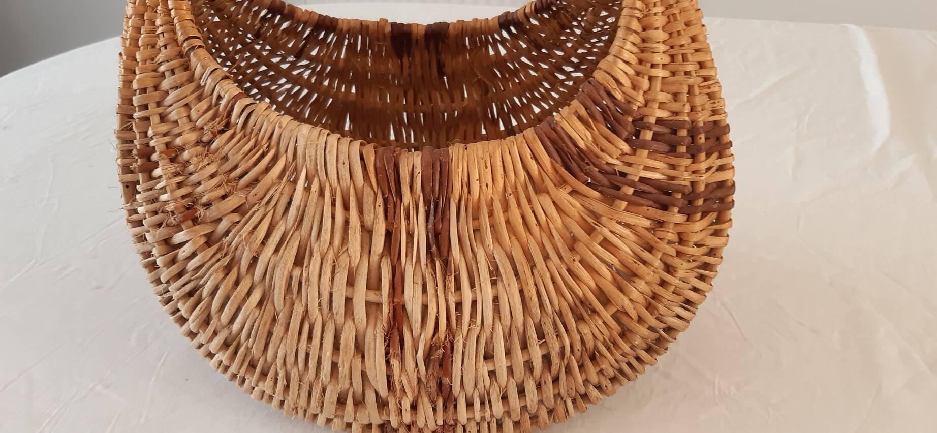 Old banana basket with wicker two colors