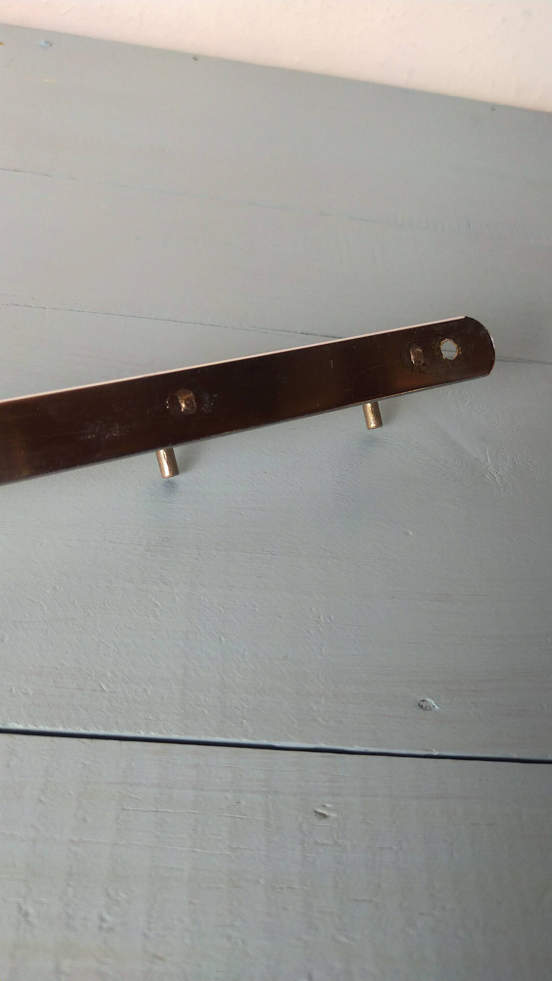 Two chrome tea towel hooks