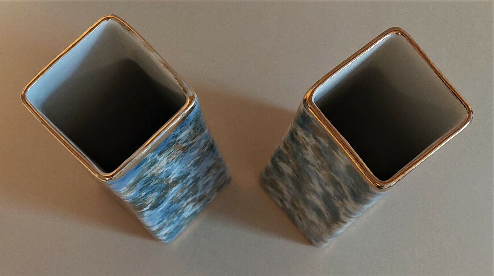 Pair of Limoges porcelain vases speckled decoration