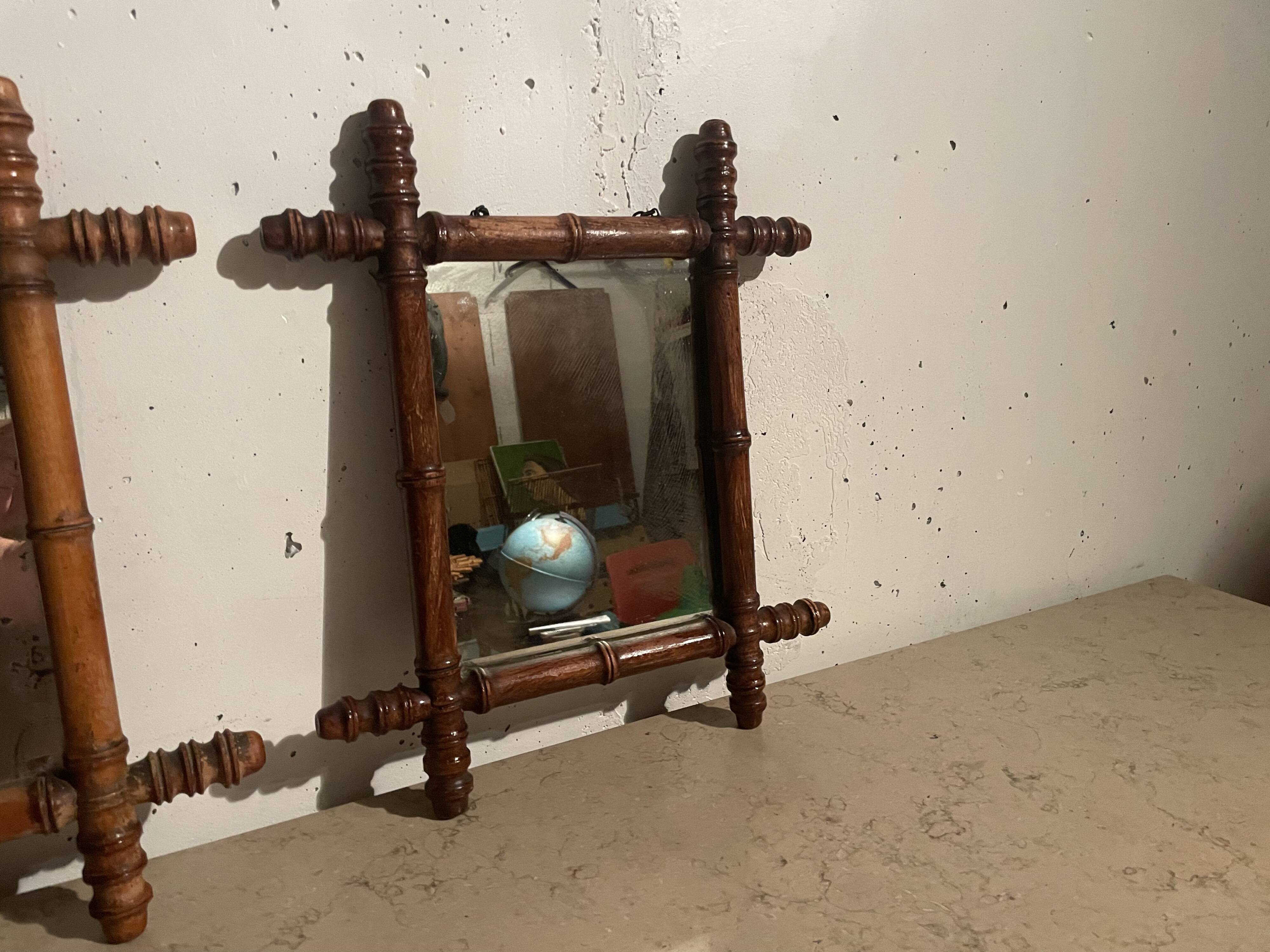 Pair of wooden mirrors from the 1940s.