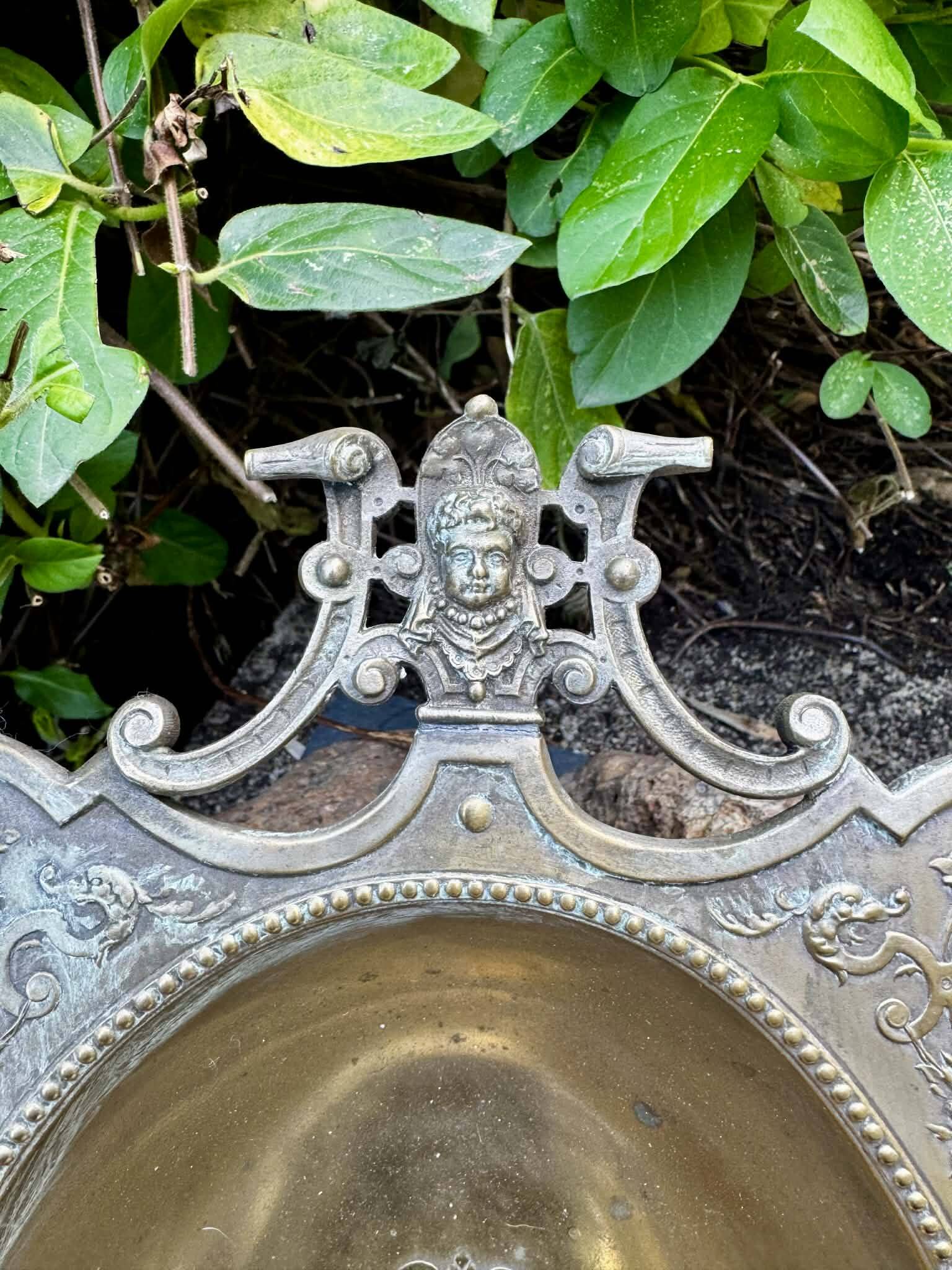 Large fruit bowl with mascaron signed WMF, Art Nouveau period.