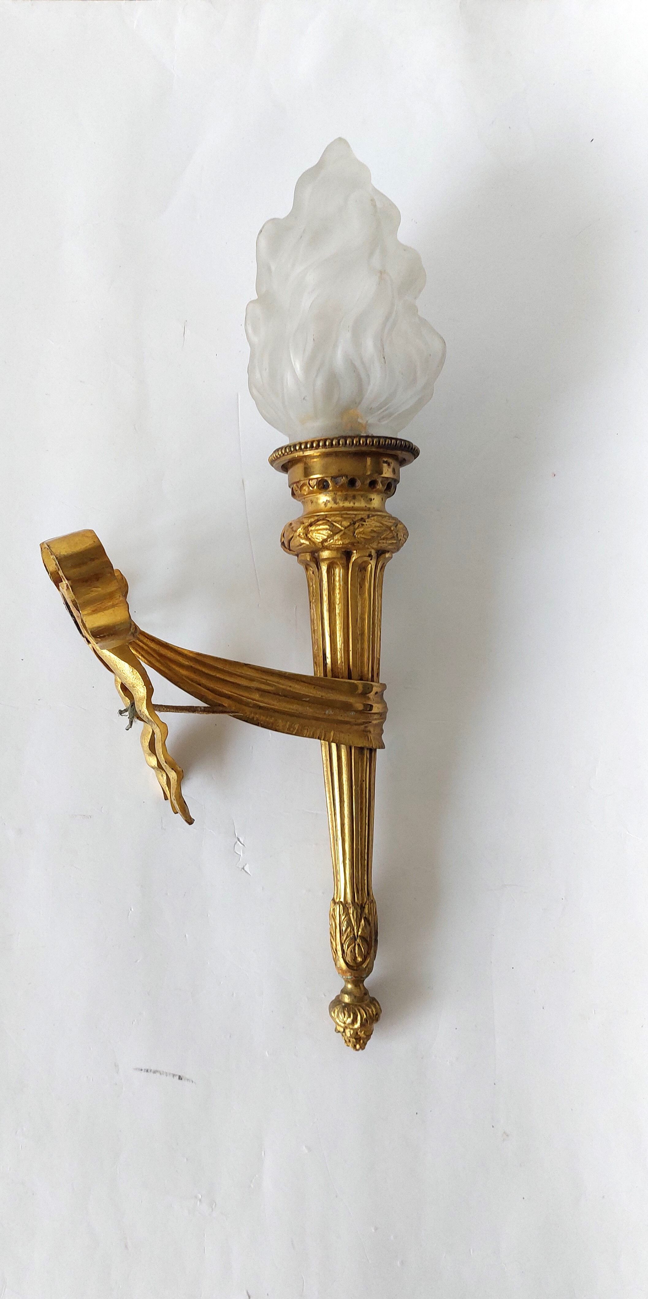Torch wall lamp in gilded bronze Louis XVI Circa Napoleon III style.