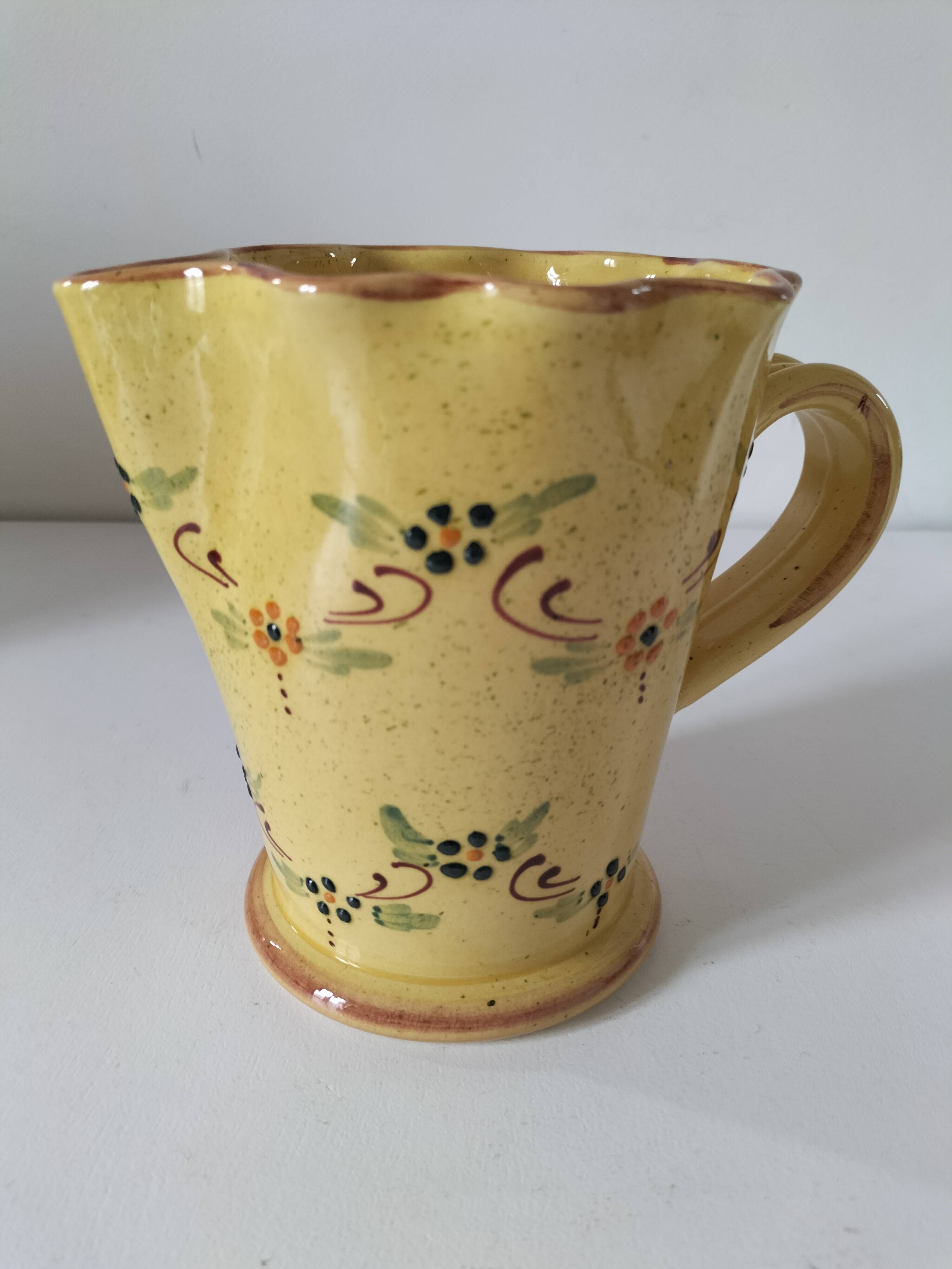 JP Daniel handmade earthenware pitcher – floral decoration on a yellow background