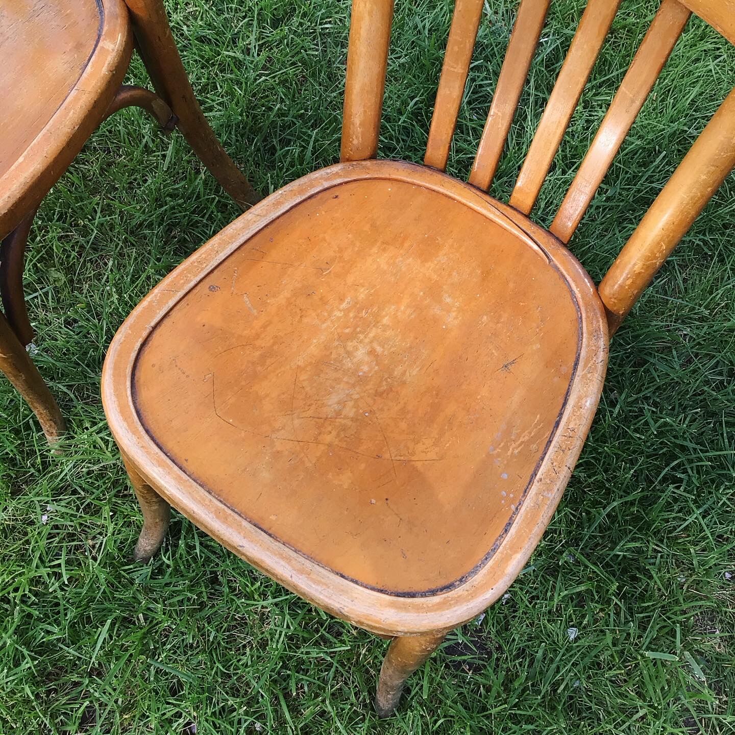 Lot of two wooden bistro chairs