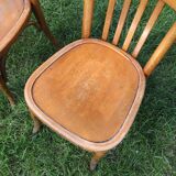 Lot of two wooden bistro chairs