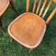 Lot of two wooden bistro chairs