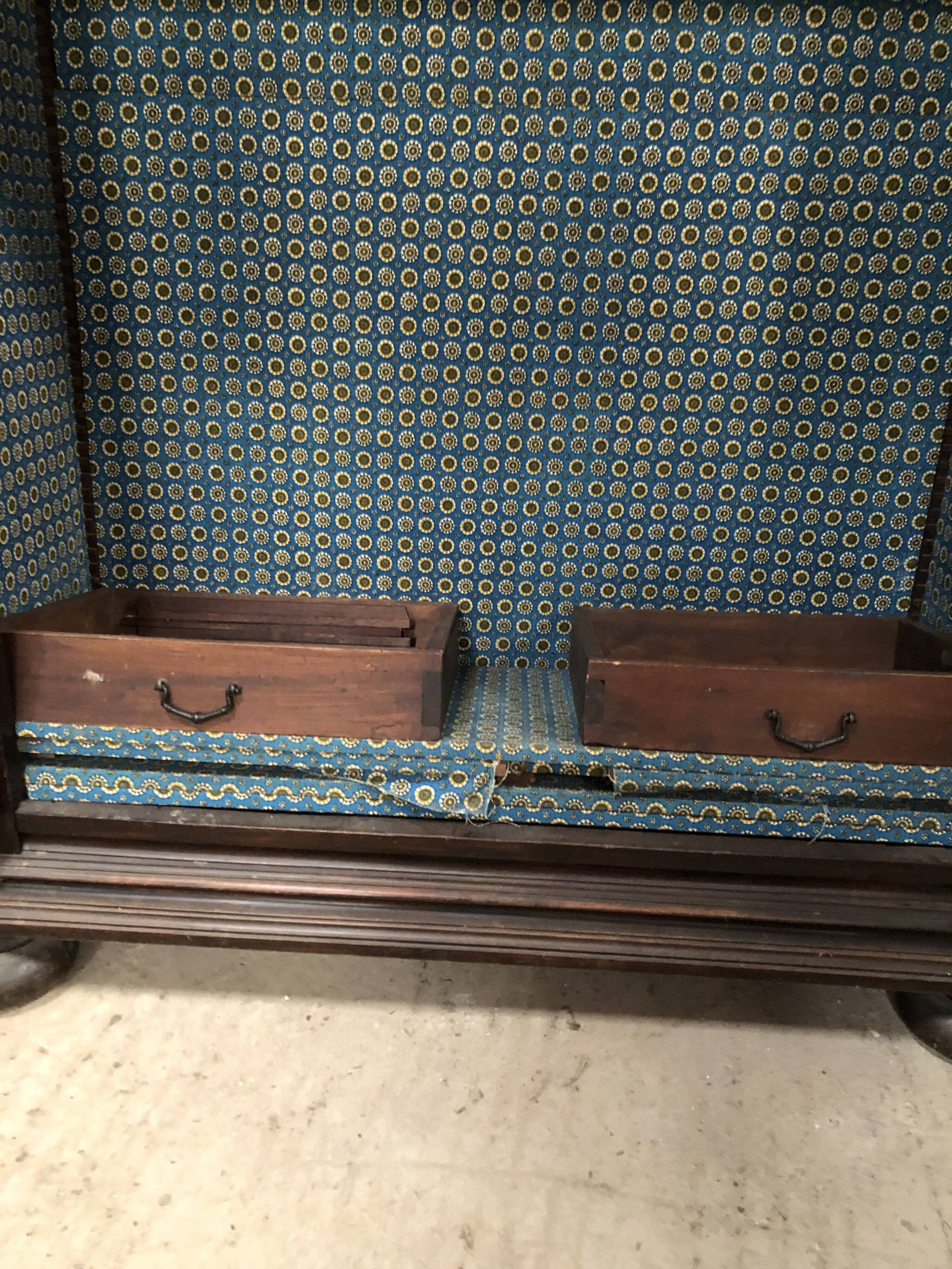 Antique Louis XIII armoire in solid walnut with carved doors