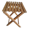 Old folding stool in fisherman's or painter's wood