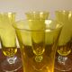 Large transparent yellow champagne flutes