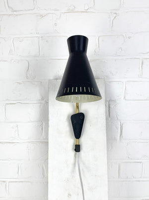 Scandinavian Diabolo wall light model 215 by EAE, Sweden, 1950s.
