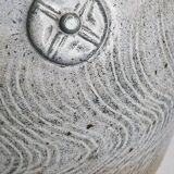 Stoneware vase signed by Sylvie Dufour, incised decoration and relief medallions, 28 cm.