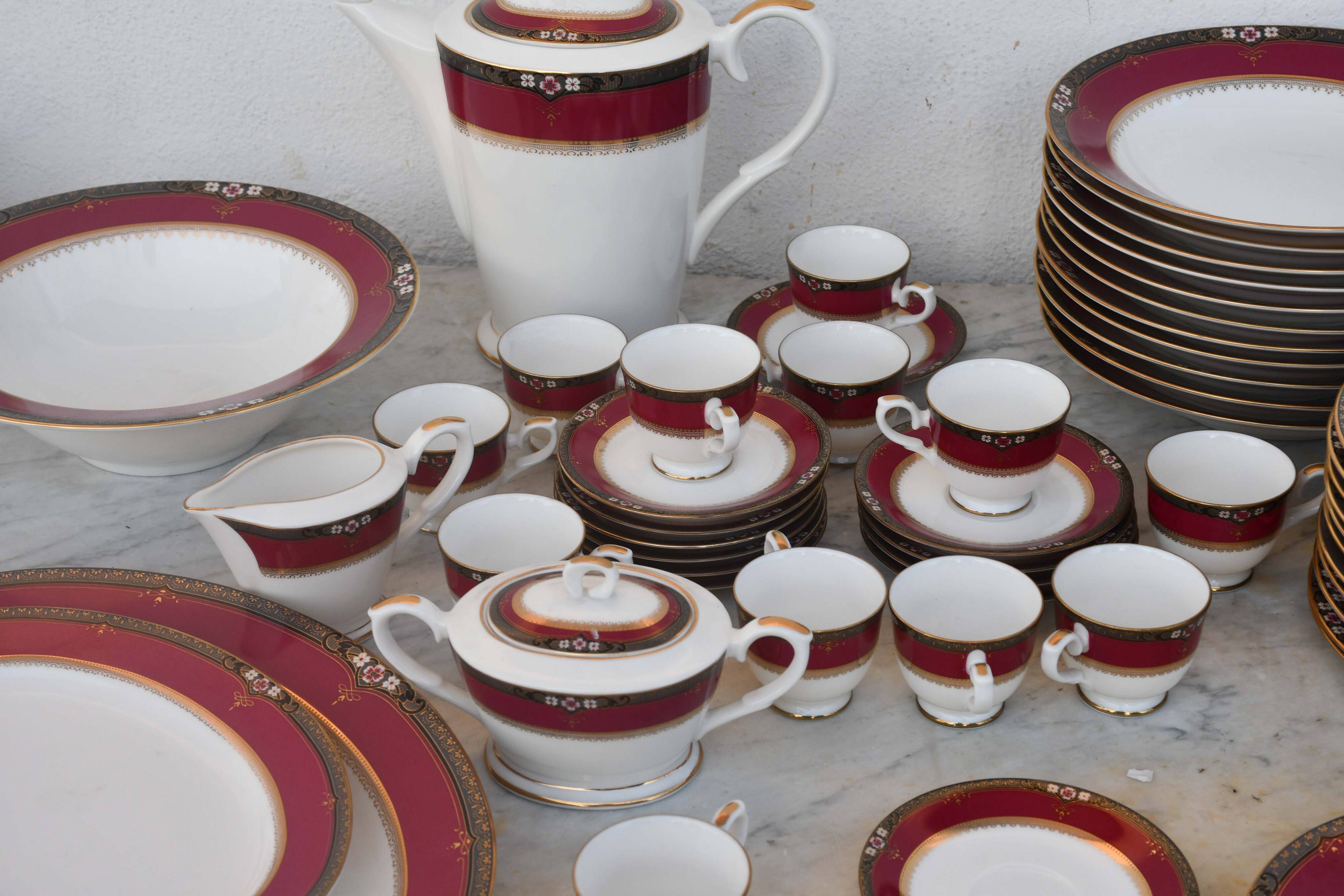 Elegant mid-century Japanese bone china service for 12 in white and noble red