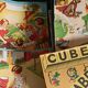 Cardboard box with wooden alphabet cubes from the 60s