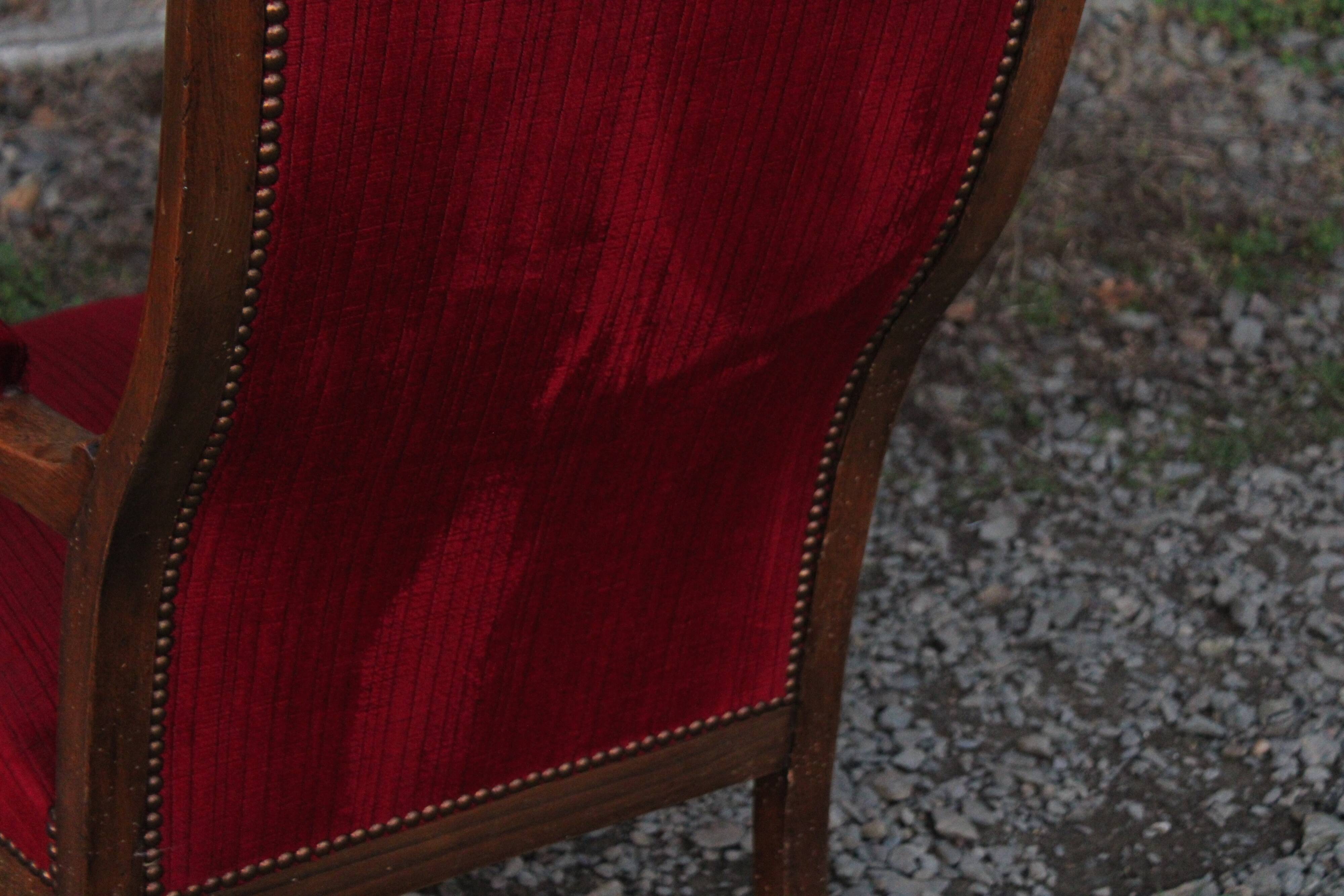 Antique Voltaire-style armchair – red velvet & solid wood