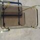 Golden metal and smoked glass dessert table