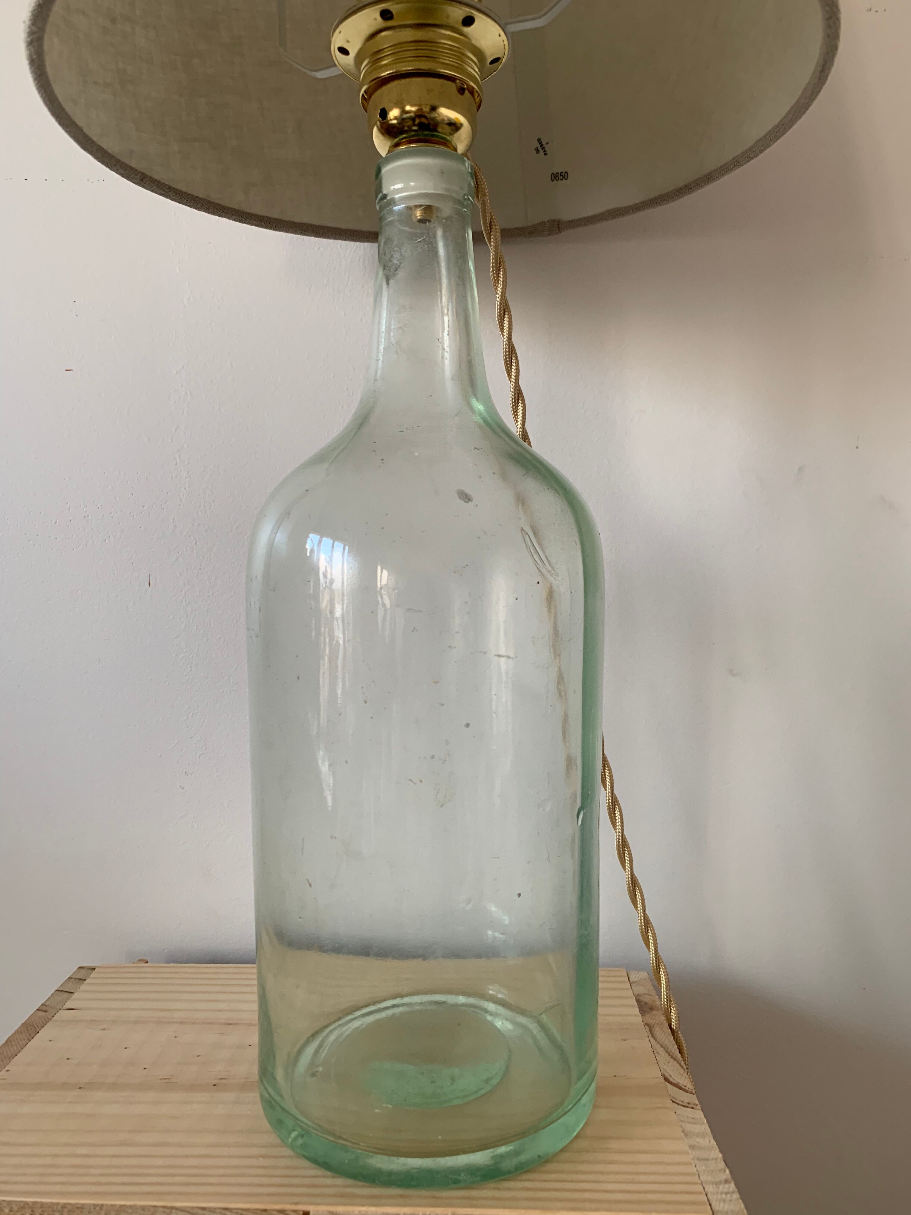 Old demijohn lamp