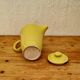 Vintage yellow ceramic teapot