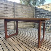 Extendable teak table, sled base, vintage style.