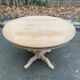 Round extendable dining table with a central pedestal base, renovated in raw wood, 150cm