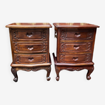 Pair of carved mahogany bedside tables.