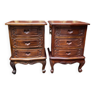 Pair of carved mahogany bedside tables.
