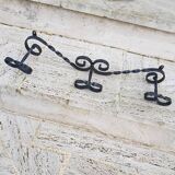 Wrought iron wall coat rack