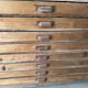 Low workshop cabinet with 8 drawers in solid wood, printing style.
