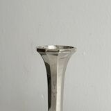 single flower vase or metal candlestick