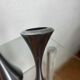 Pair of designer candle holders in stainless steel