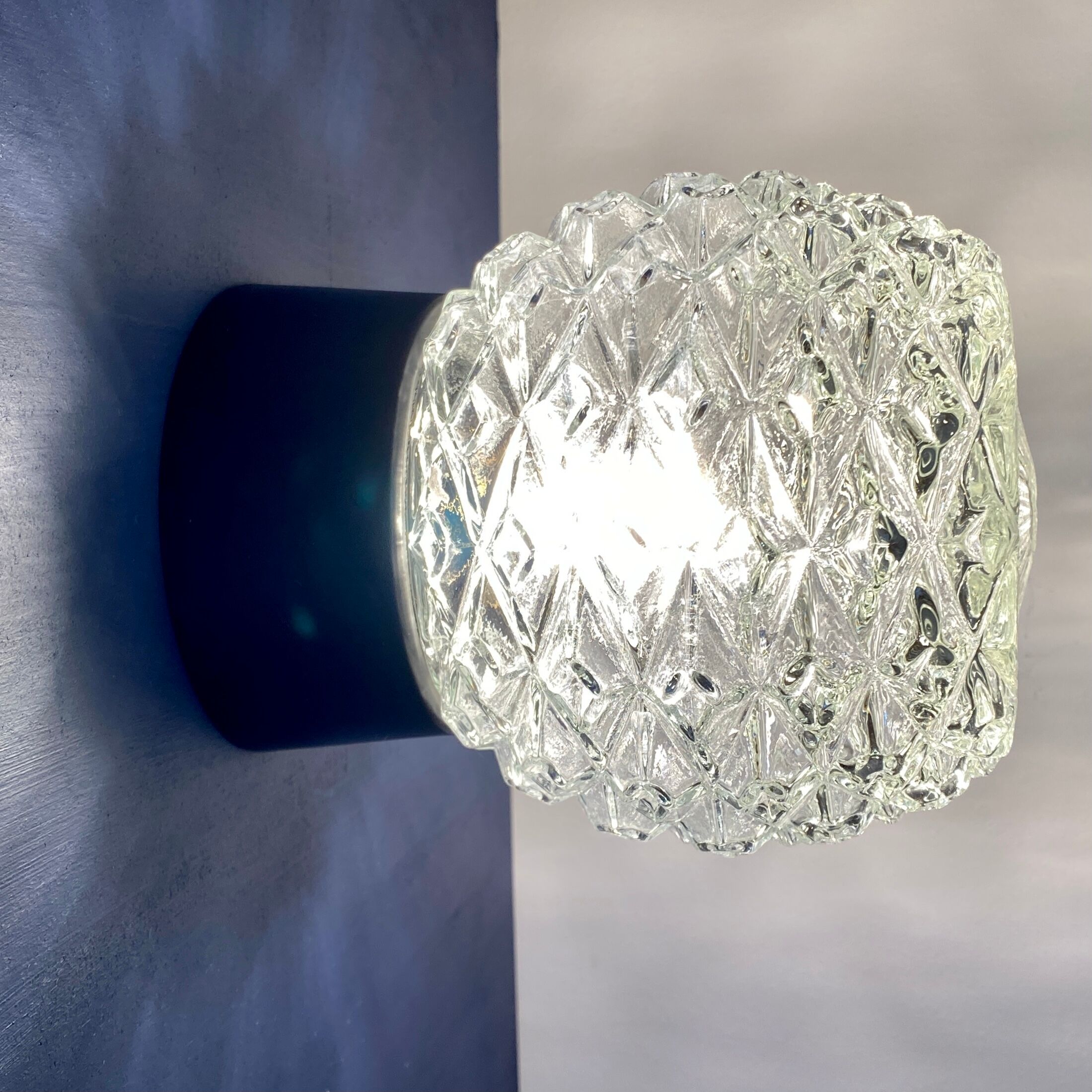 Pair of vintage wall lamps in molded glass and thermoplastic