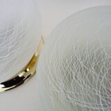 Pair of wall or ceiling lights with white-edged globe. 80 years