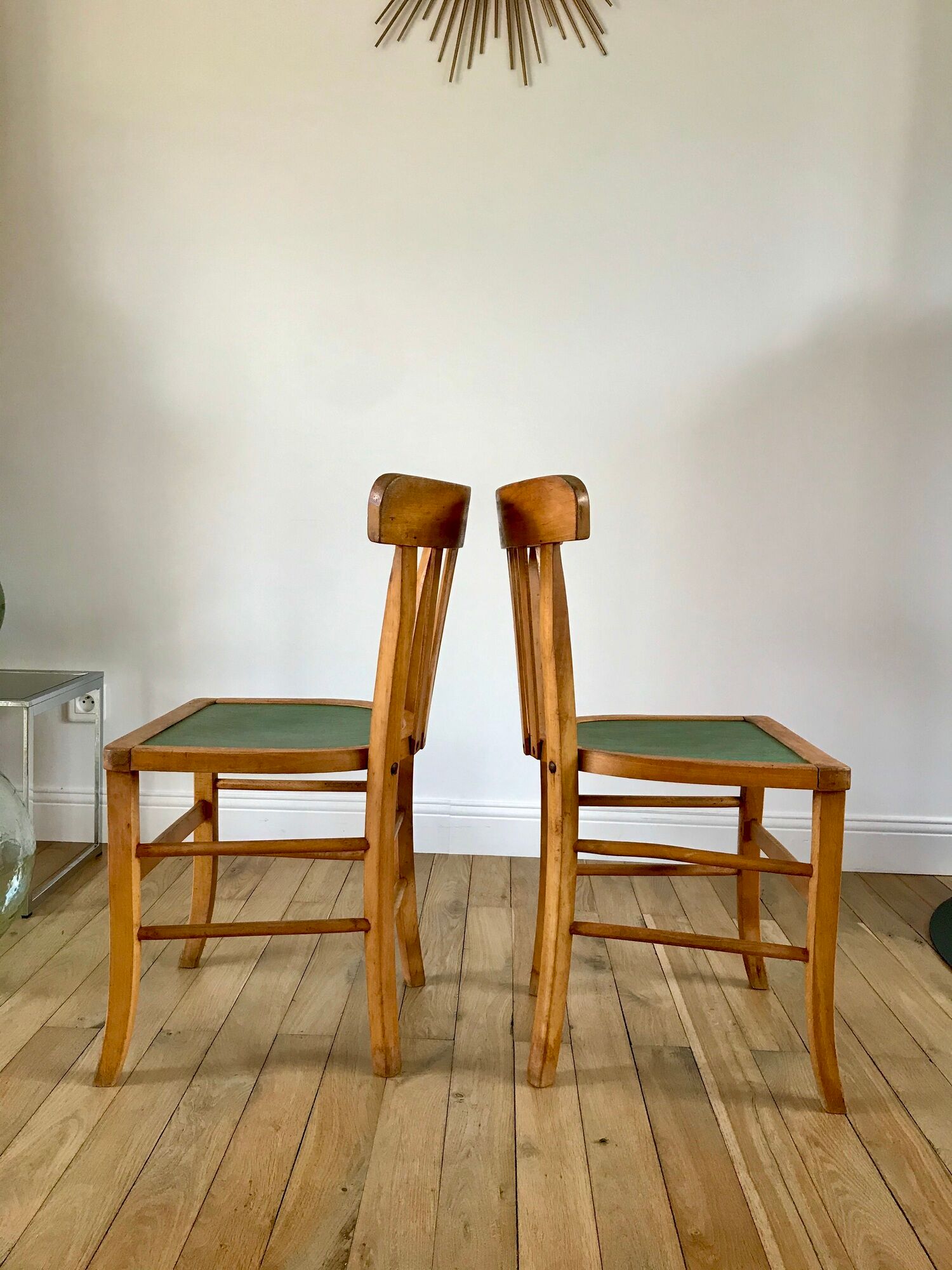 Pair of bistro chairs in light curved wood and green seat 1950s