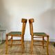 Pair of bistro chairs in light curved wood and green seat 1950s