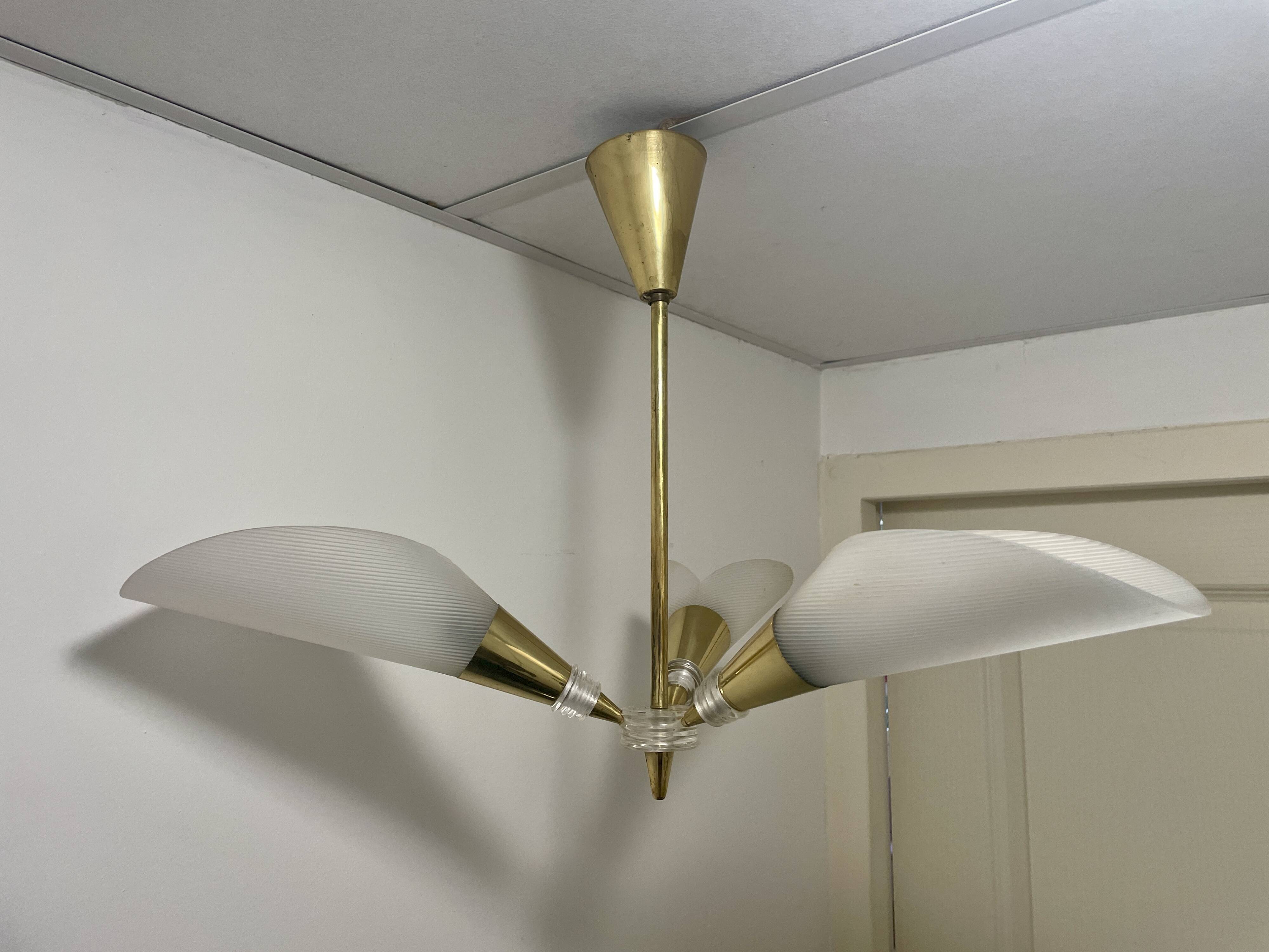 Vintage chandelier with plexiglass and brass cones