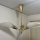 Vintage chandelier with plexiglass and brass cones