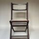 Set de quatre chaises pliantes en bois et cannage