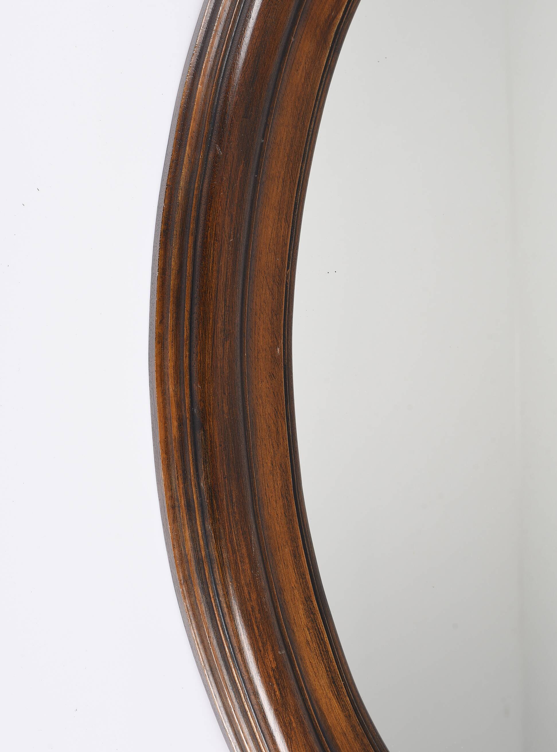 Large old oval wooden mirror
