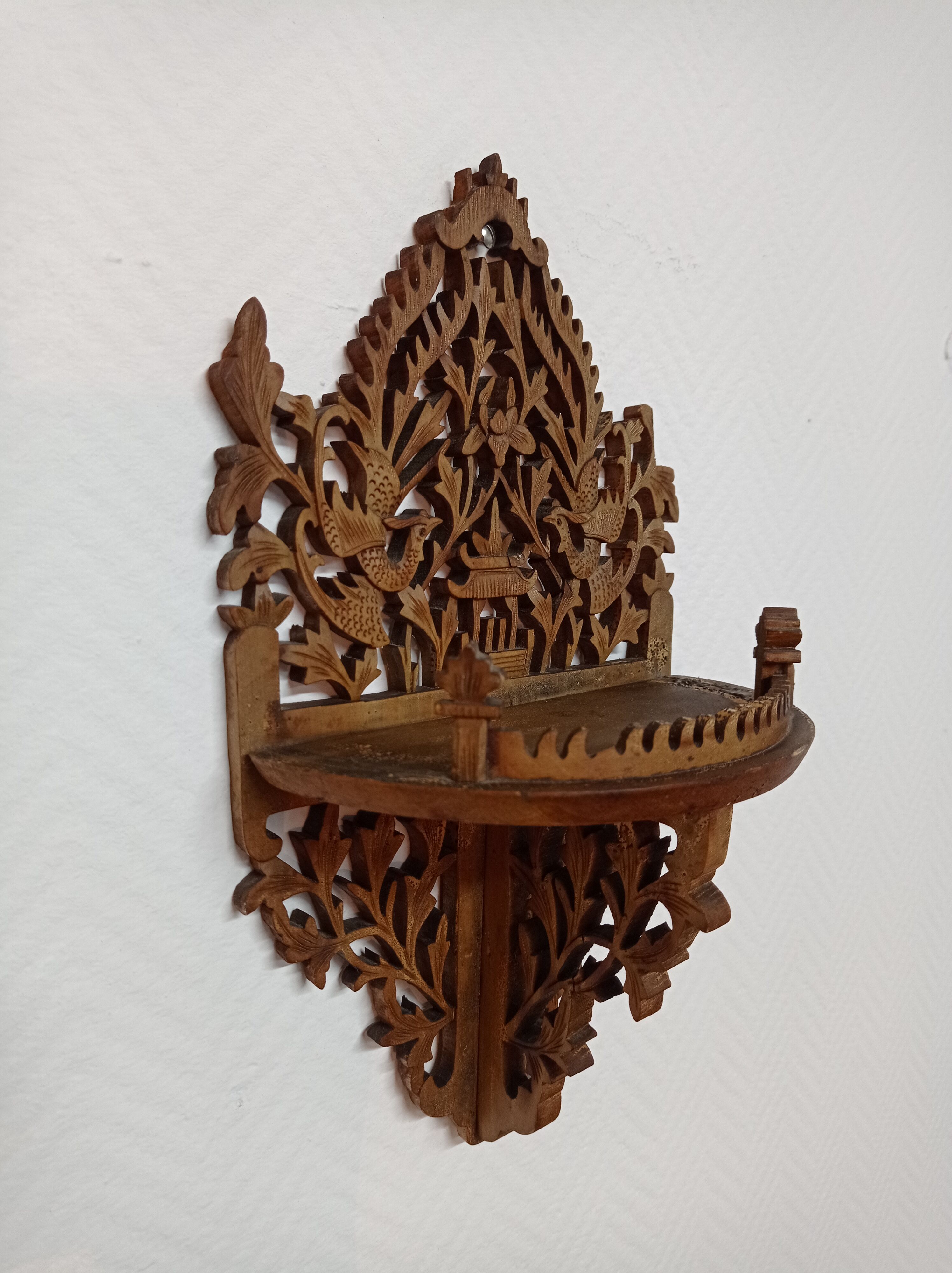 Small wooden wall shelf