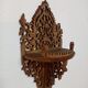 Small wooden wall shelf