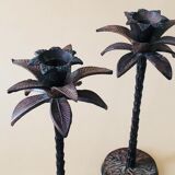 Pair of patinated metal candlesticks
