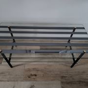 Vintage coffee table in glass and mirror strips.