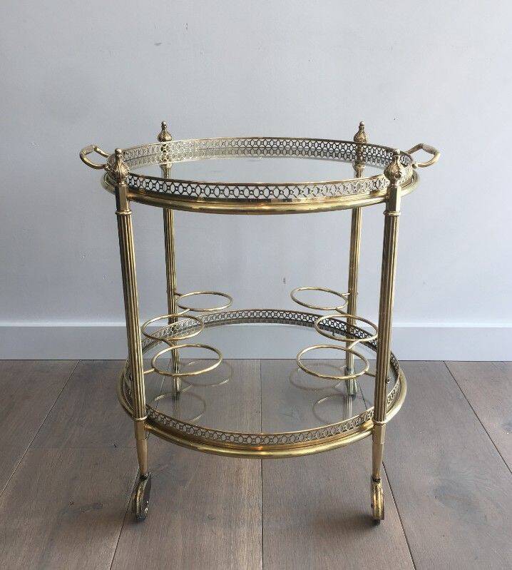 Round brass rolling table attributed to Maison Jansen