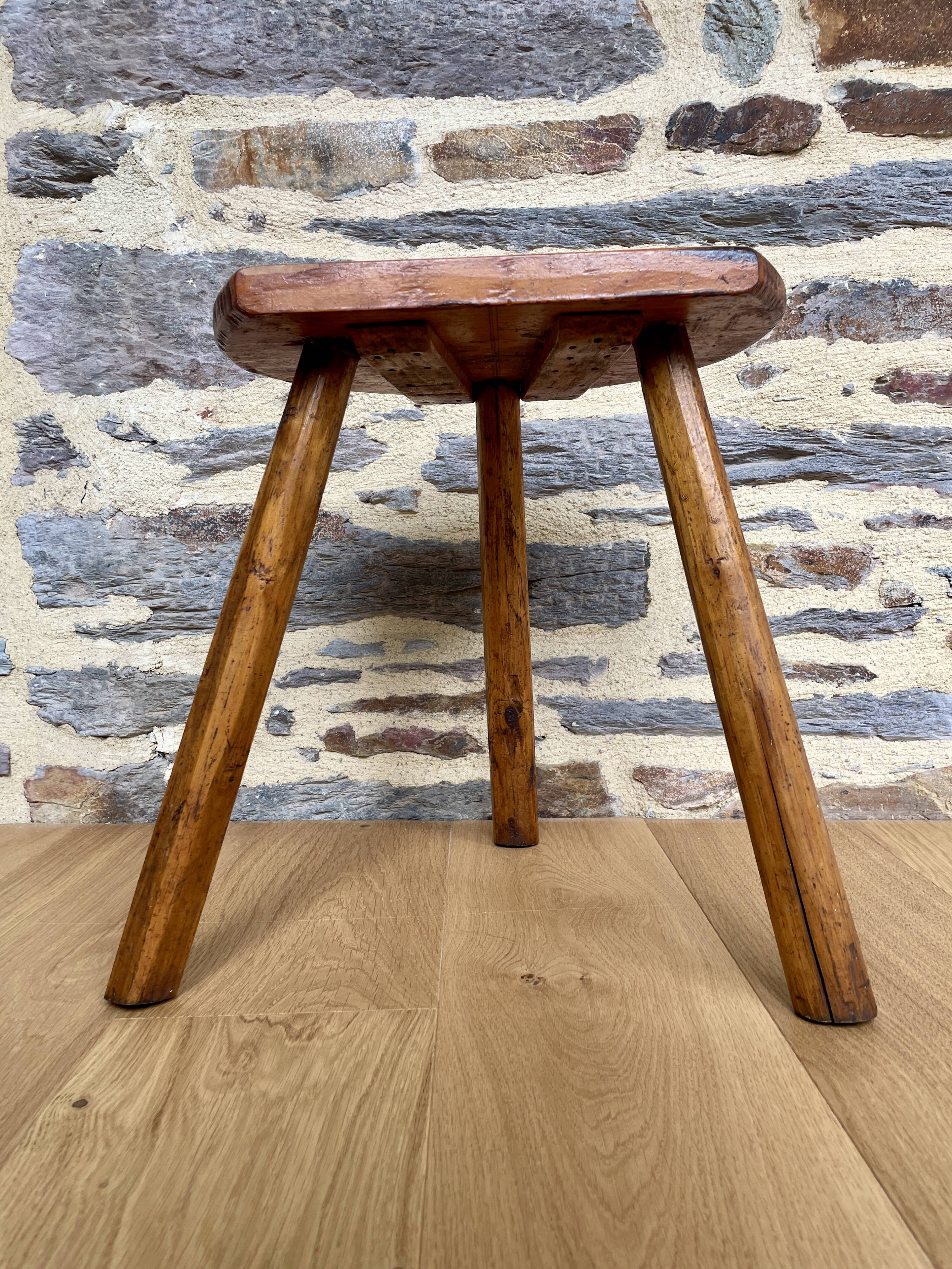 Old wooden farm stool