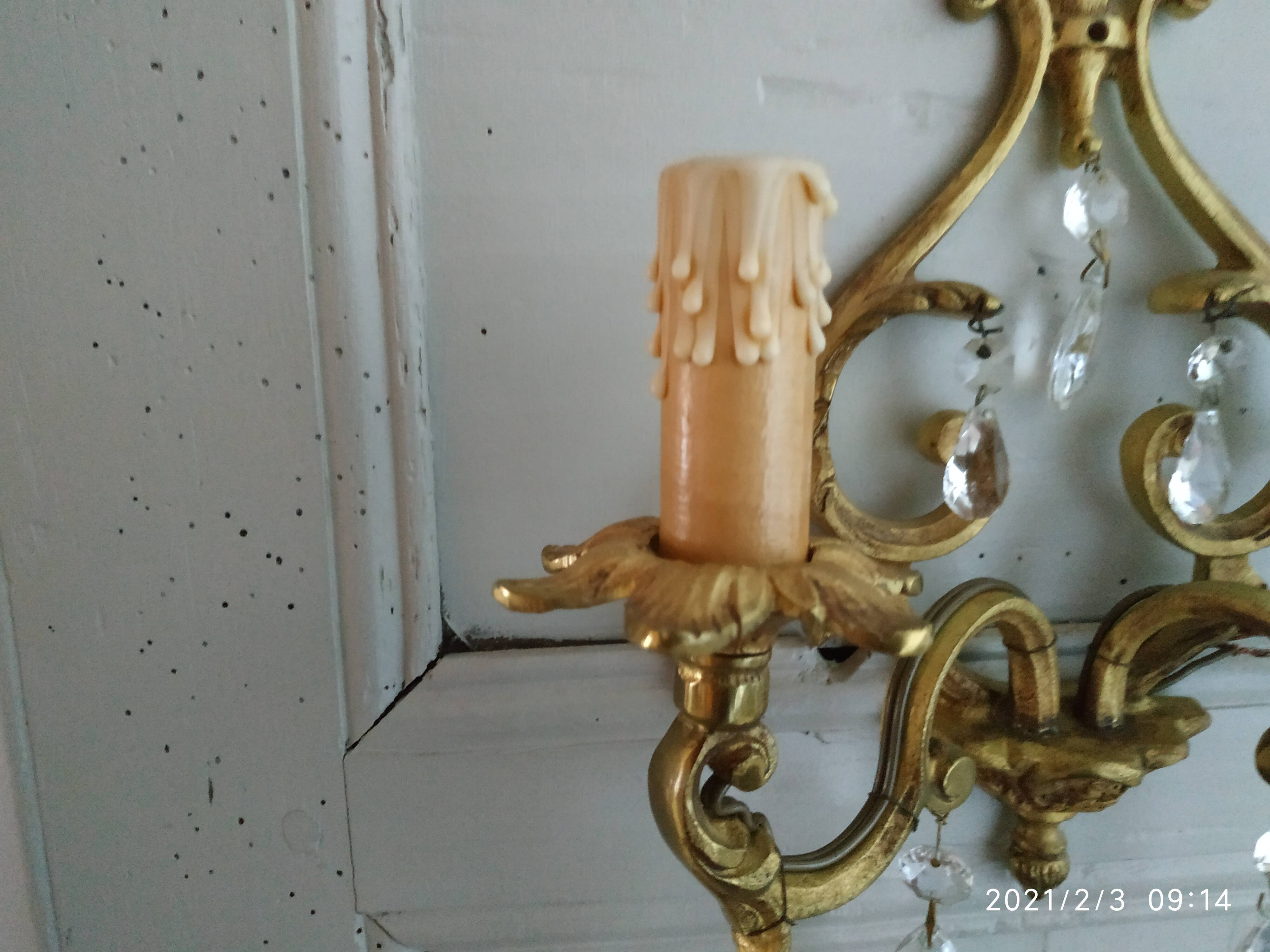 Bronze and stamps sconce