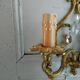 Bronze and stamps sconce