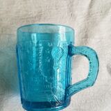 Old turquoise glass cup