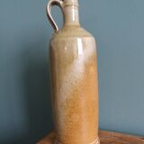 Bottle with handle, pitcher, in stoneware, signed
