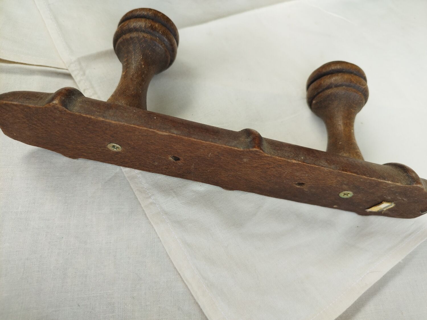 Wooden coat rack turned two hooks